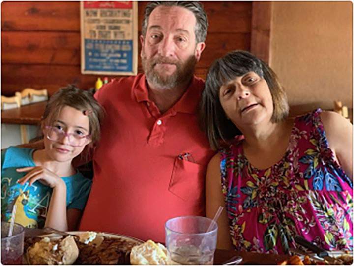 In this undated photo provided by Stephanie Melendez, is her father David Johnson, center, her daughter, Kaitlyn-Rose Melendez, left, and Stephanie’s mother Kathy Johnson. The Johnson family credits him with saving granddaughter Kaitlyn Rose, 9, and his wife, Kathy, by pushing them to the ground at a checkout counter when a gunman opened fire Aug. 3, 2019,at the Wal-Mart in El Paso, Texas.