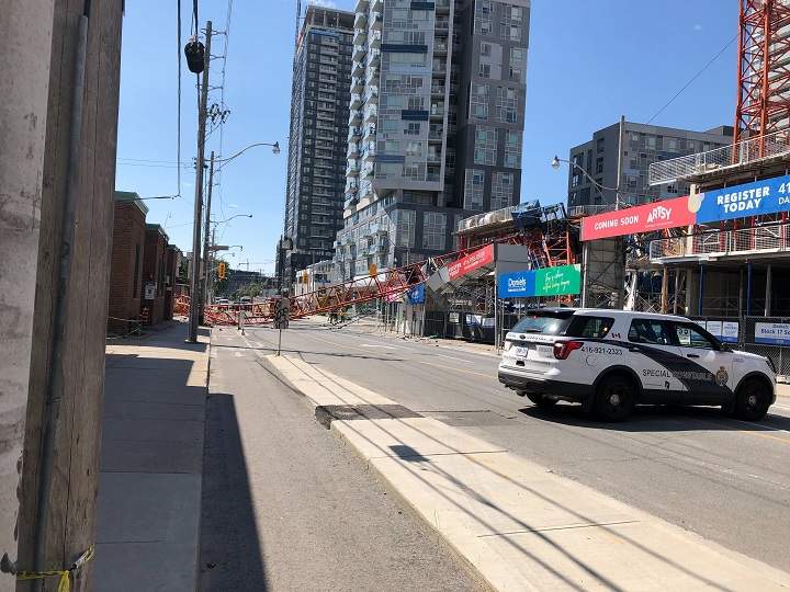 A photo of a crane that fell on River and Dundas streets in Toronto.