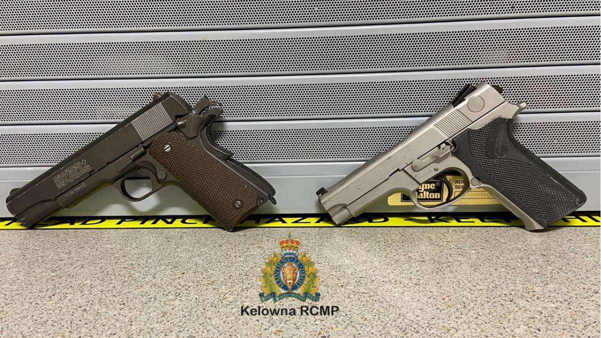 Police released this photo to show how difficult it can be to tell which guns are real. The black and brown pistol on the left is a bb gun and the grey pistol on the right is a police service weapon.