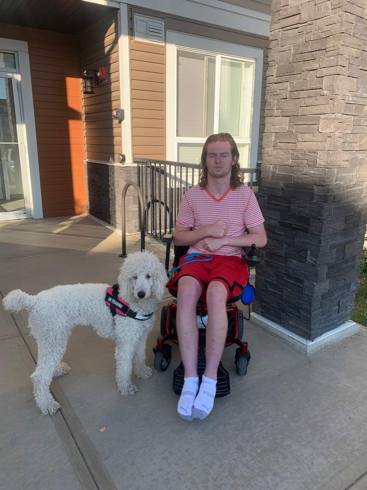 Lucas and his poodle, Lisa.