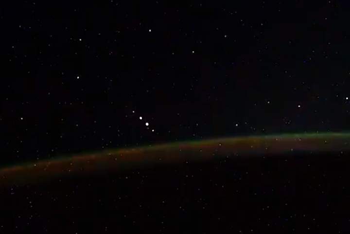 Russian astronaut Ivan Vagner claims that several dots lined up in space over the Earth are ‘space guests.’