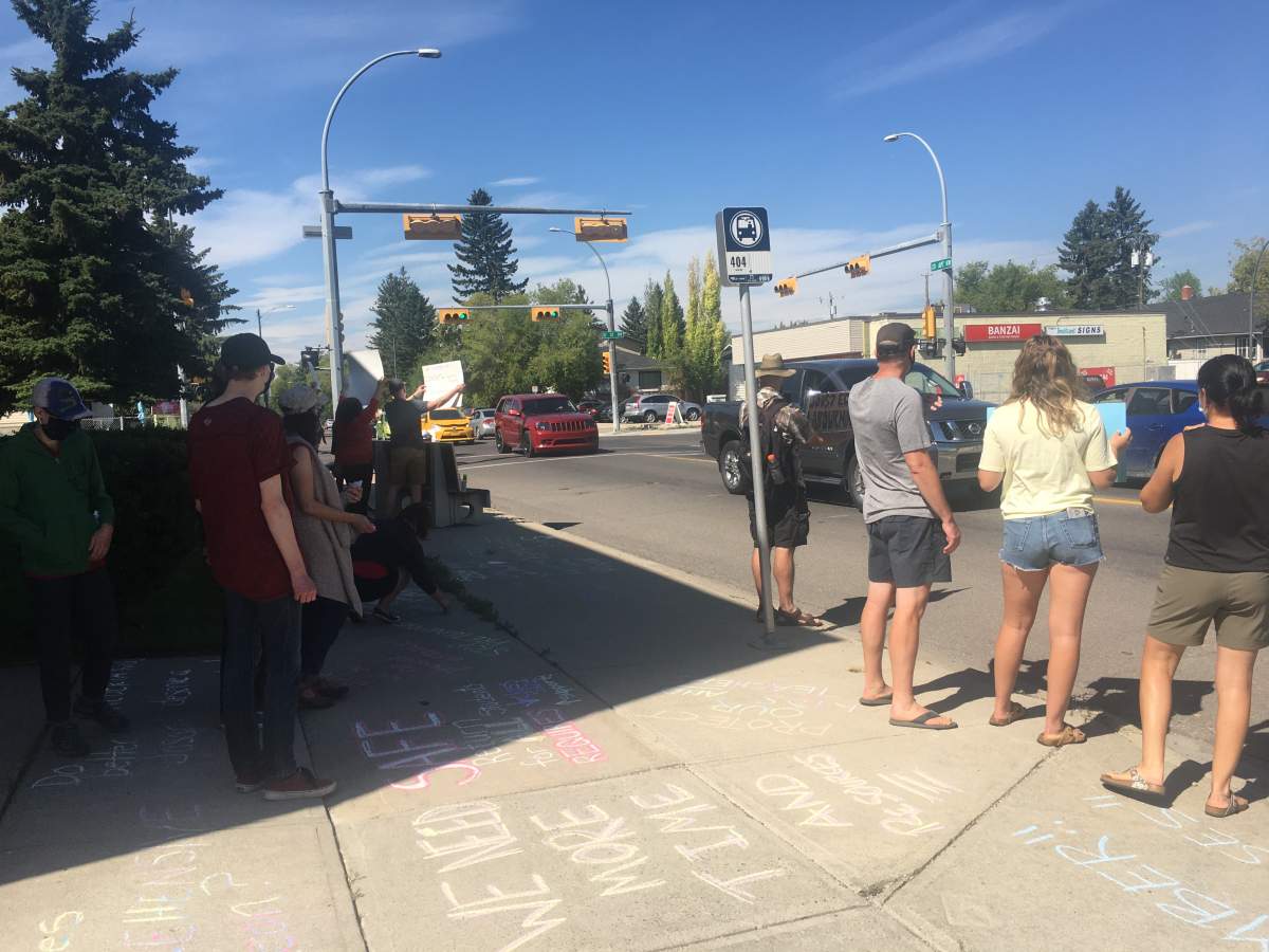 Protesters gather in the Calgary Varsity riding Friday, Aug. 21, 2020, calling on the UCP government for additional funding for schools ahead of the 2020 return to class.