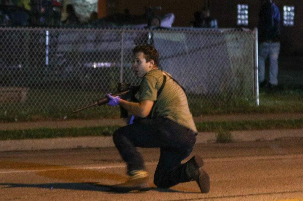 A suspected gunman is shown in Kenosha, Wis., after a protester was shot on Aug. 25, 2020.