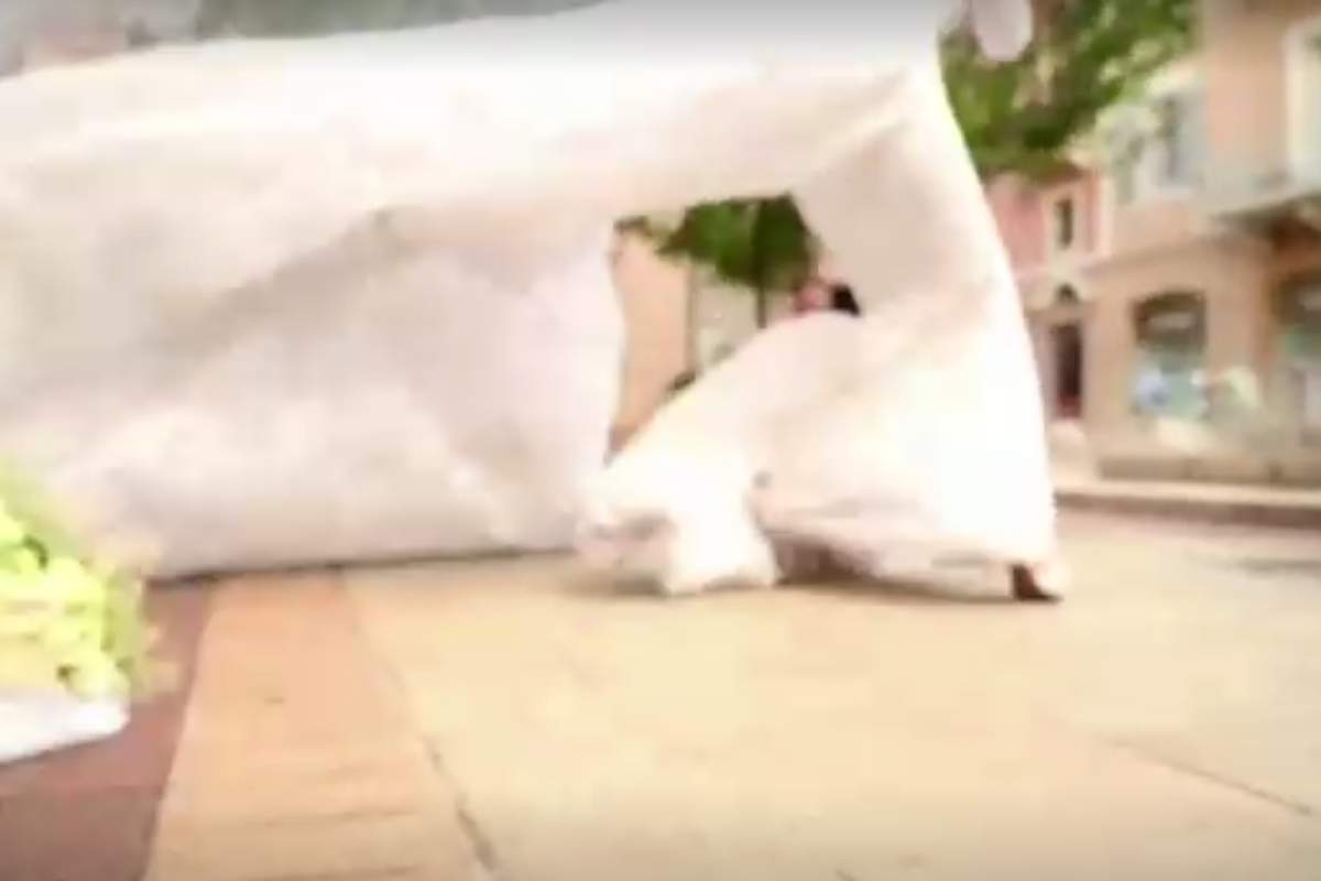 Bride Israa Seblani’s dress is blown out by an explosion in Beirut, Lebanon on Aug. 4, 2020.
