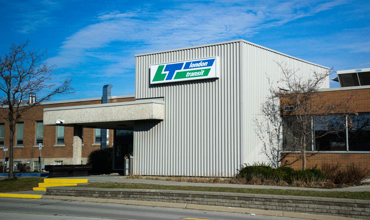 The London Transit Commission's headquarters building in front of a blue sky with a few clouds.