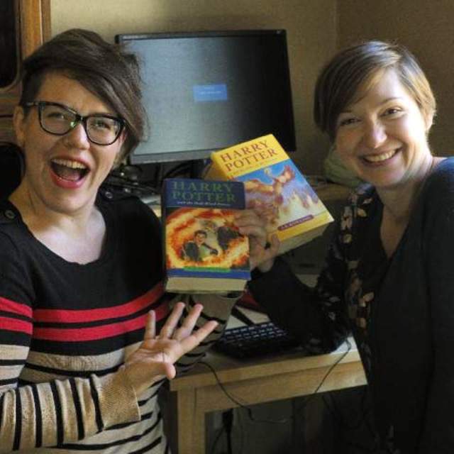 Hannah McGregor and Marcelle Kosman with their Harry Potter books.