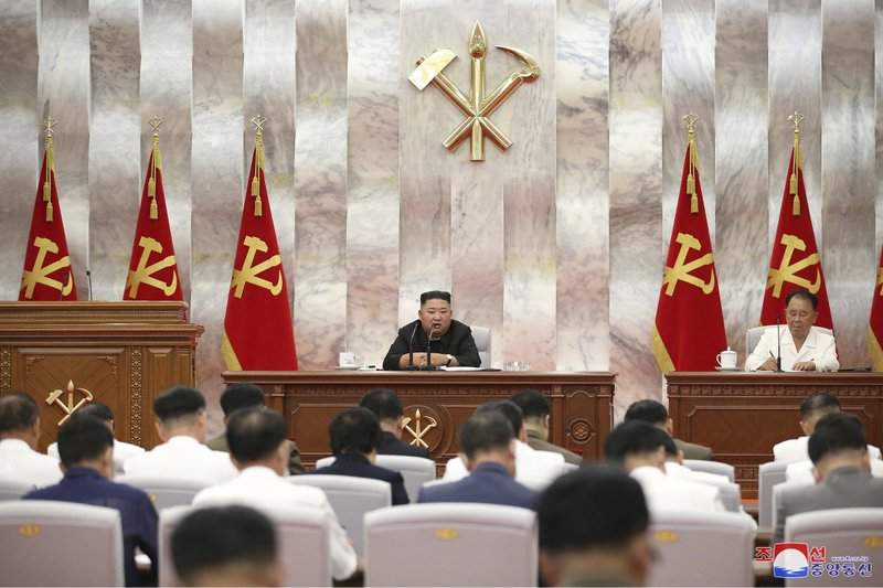 In this photo provided by the North Korean government, North Korea leader Kim Jong Un speaks during a Workers’ Party meeting in Pyongyang, North Korea, Tuesday, Sept. 8, 2020. Kim during the high-level political conference called for urgent efforts to rebuild thousands of homes and other structures destroyed by Typhoon Maysak that slammed the country’s eastern region last week, state media said Wednesday, Sept. 9. Independent journalists were not given access to cover the event depicted in this image distributed by the North Korean government. The content of this image is as provided and cannot be independently verified. Korean language watermark on image as provided by source reads: "KCNA" which is the abbreviation for Korean Central News Agency. 