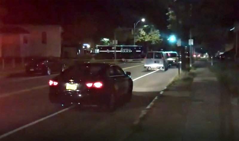 Police respond to the scene of a shooting early Saturday, Sept. 19, 2020 in Rochester, N.Y. As many as 100 people were at a backyard party when the shooting started just before 12:30 a.m., Acting Police Chief Mark Simmons told reporters. 

