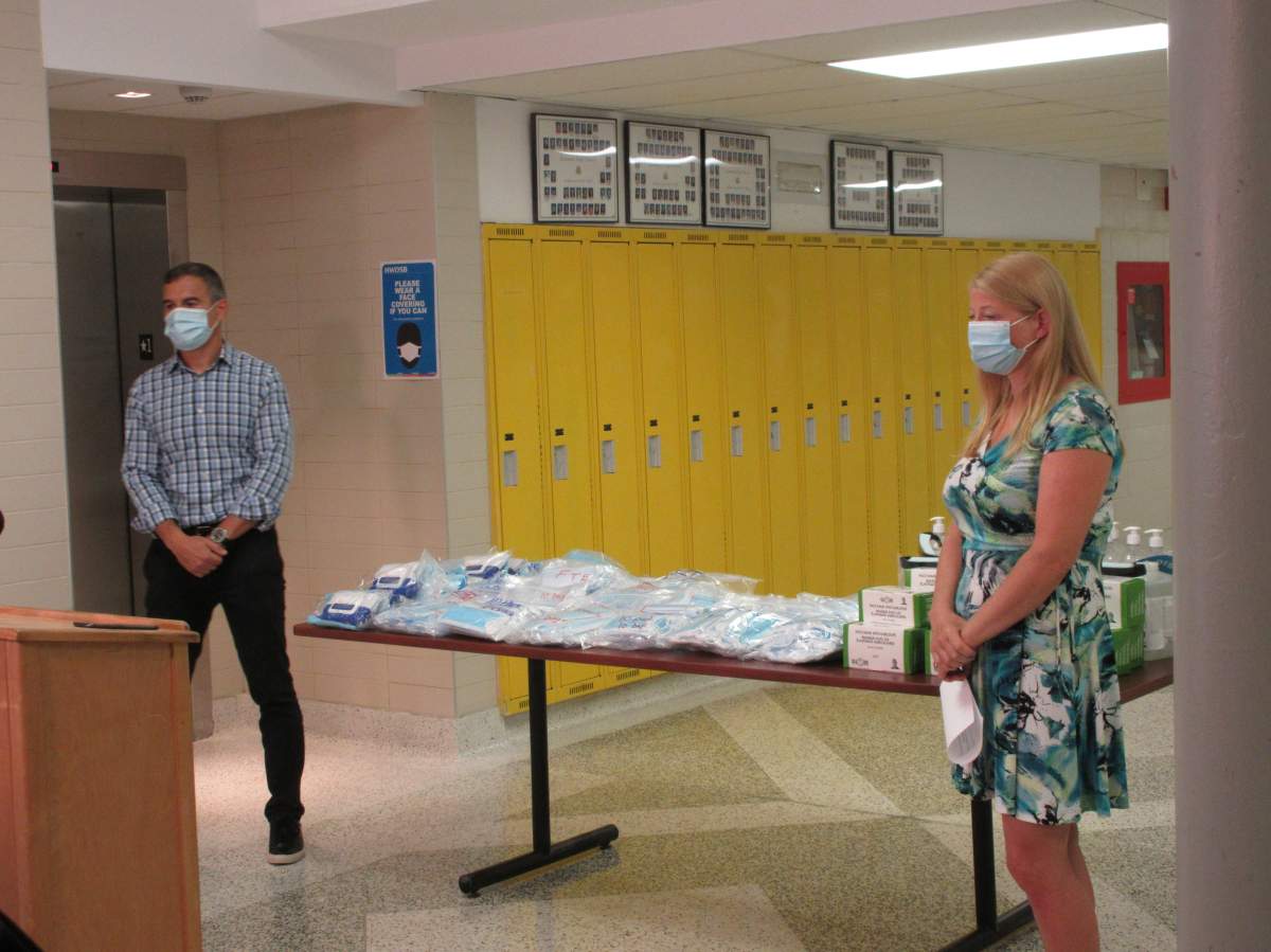 Hamilton-Wentworth school district school board director Manny Figueiredo and chair Alex Johnstone show off samples of PPE that will be used by teachers and staff during the 2020-21 school year.