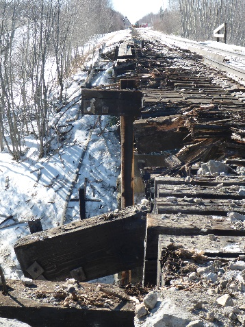 The April 2019 Coal Branch derailment damaged a rail bridge located just after the Lakeville Road crossing.