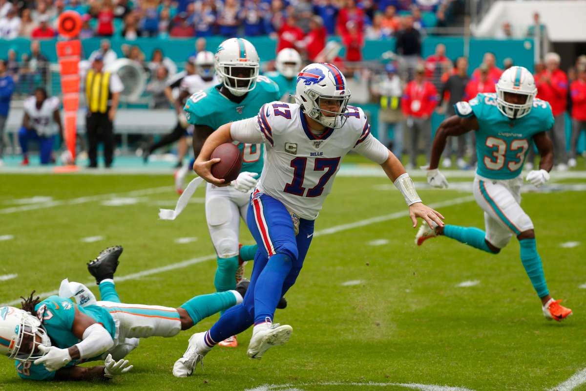Buffalo Bills quarterback Josh Allen (17) scrambles for yards, during the first half at an NFL football game against the Miami Dolphins, Sunday, Nov. 17, 2019, in Miami Gardens, Fla.