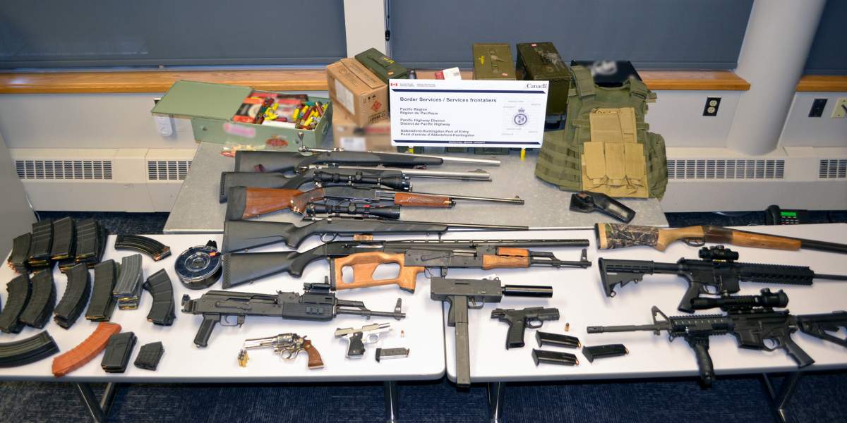 Border officials say these 14 guns were seized at the Abbotsford-Huntington port of entry on July 27, 2020.
