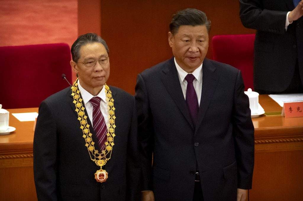 Chinese President Xi Jinping, right, stands with Chinese medical expert Zhong Nanshan after awarding him a medal at an event to honor some of those involved in China's fight against COVID-19 at the Great Hall of the People in Beijing, Tuesday, Sept. 8, 2020. Chinese leader Xi Jinping is praising China's role in battling the global coronavirus pandemic and expressing support for the U.N.'s World Health Organization, in a repudiation of U.S. criticism and a bid to rally domestic support for Communist Party leadership. 