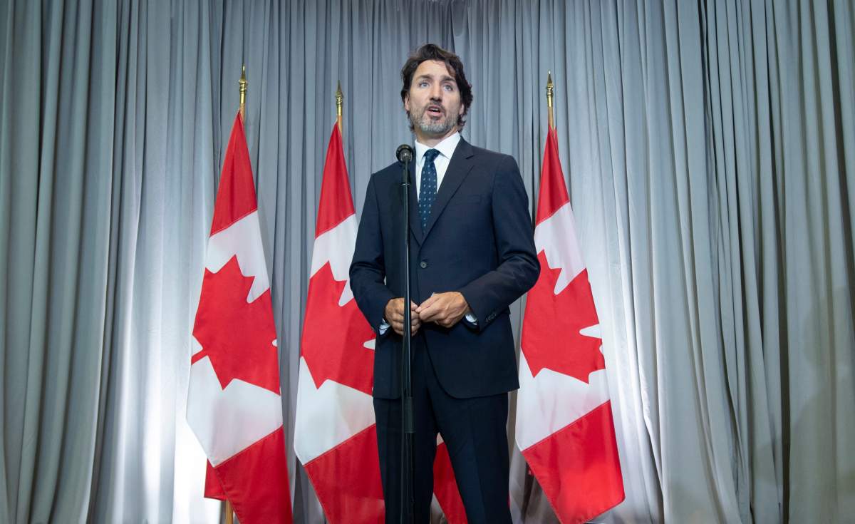 Prime Minister Justin Trudeau speaks with the media before the first day of a Liberal cabinet retreat in Ottawa, Monday, Sept. 14, 2020.