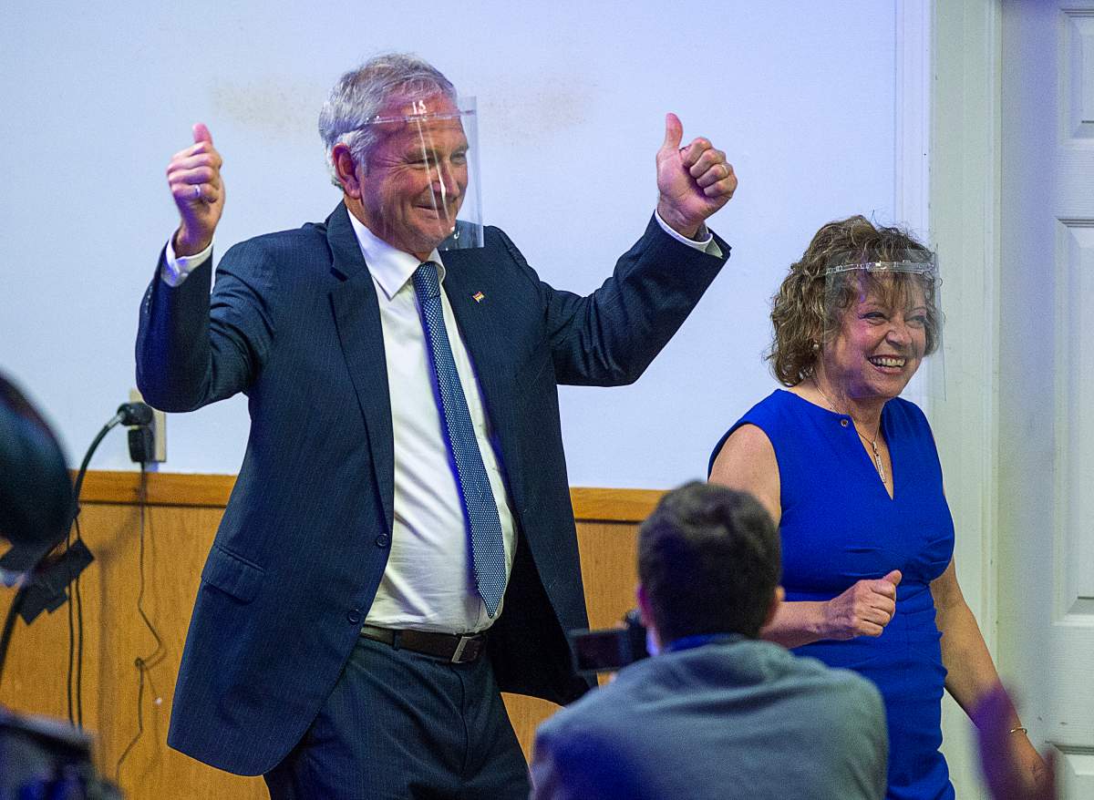 Premier Blaine Higgs, with his wife Marcia, arrives to address supporters after winning the New Brunswick provincial election in Quispamsis, N.B. on Monday, Sept. 14, 2020. The Progressive Conservative leader called the first provincial election during the COVID-19 pandemic and there was no door-to-door canvassing and no distribution of hand-held brochures. THE CANADIAN PRESS/Andrew Vaughan.