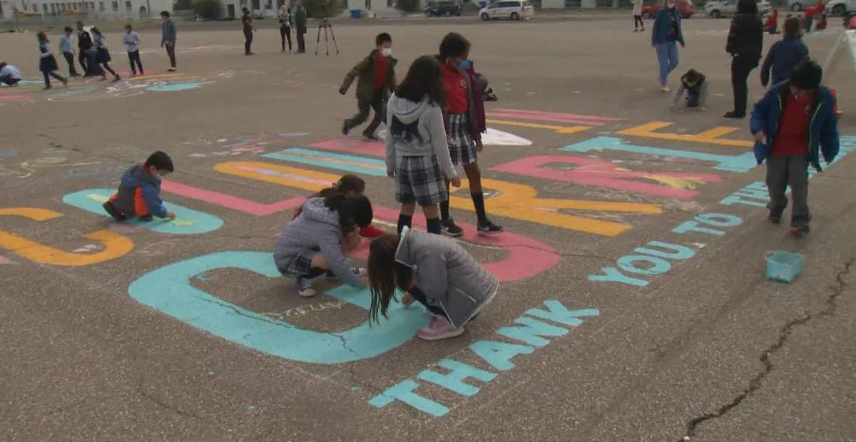 Kids and artists are brightening up the Currie neighbourhood in Calgary with chalk.