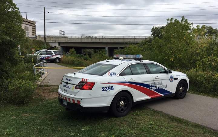 Police block off part of the West Humber Trail Monday afternoon.