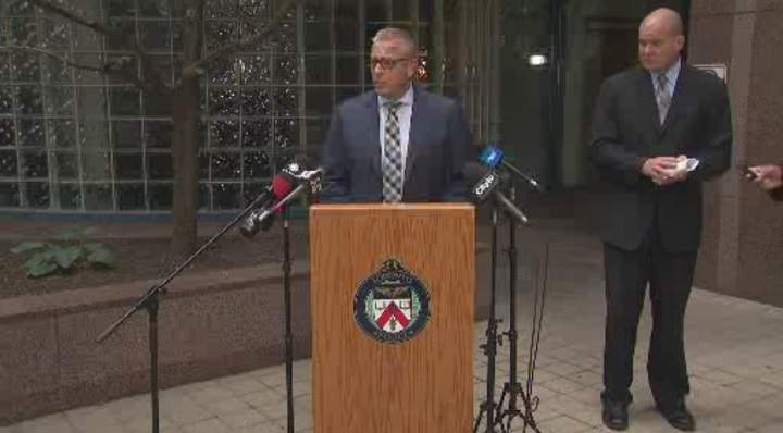 Toronto Police Det. Sgt. Ted Lioumanis and Insp. Hank Idsinga address reporters Thursday afternoon.