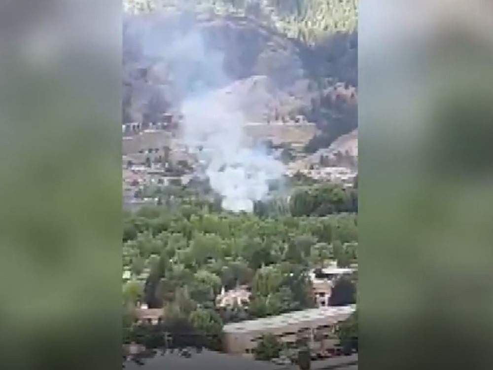 A man on a motorbike was arrested after trying to flee the fire scene on Wednesday morning, say Penticton RCMP.