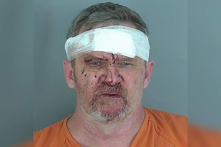 Douglas Lane, 53, is shown in this mugshot photo from Sept. 20, 2020.