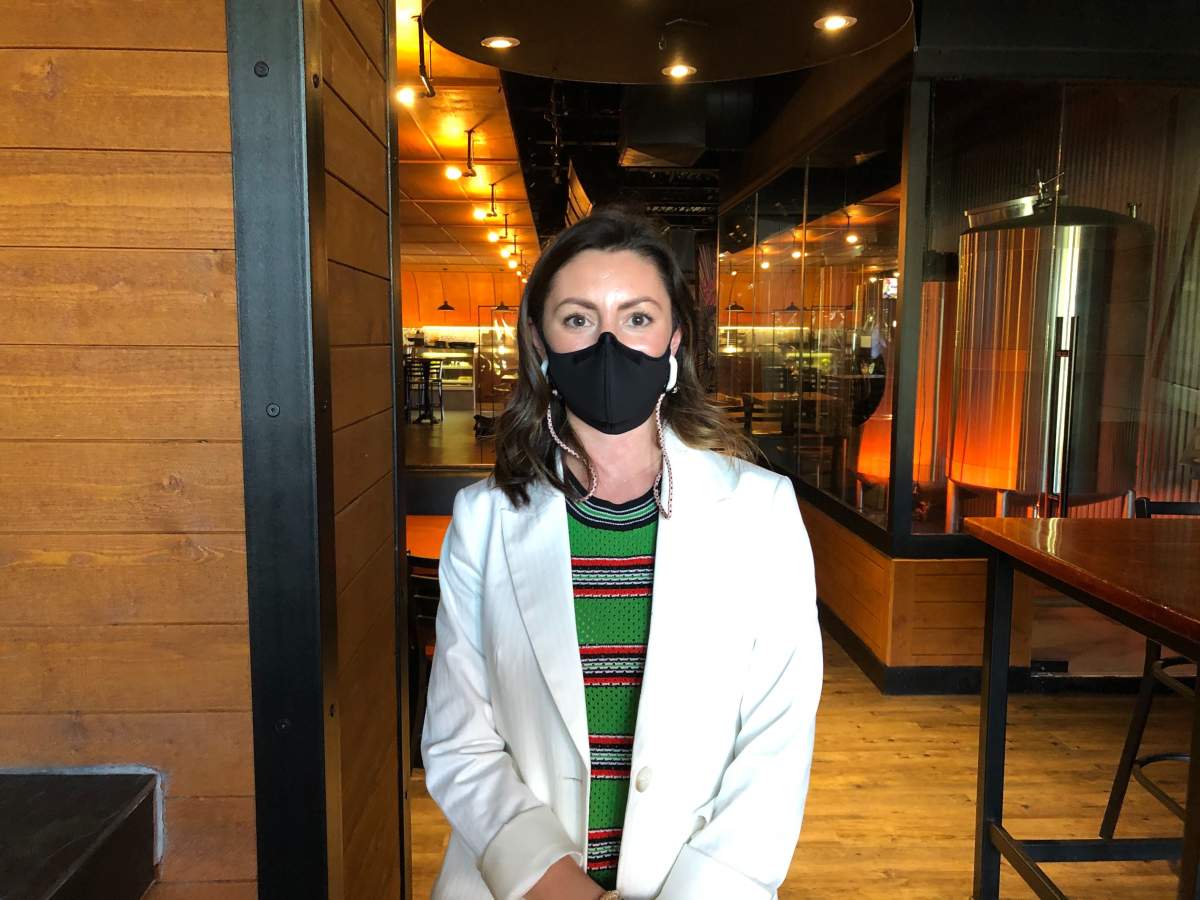 Emily Ferguson of Hangar9 says the downtown clothing store has been helped by loyal customers, but has struggled to get new people through the door.