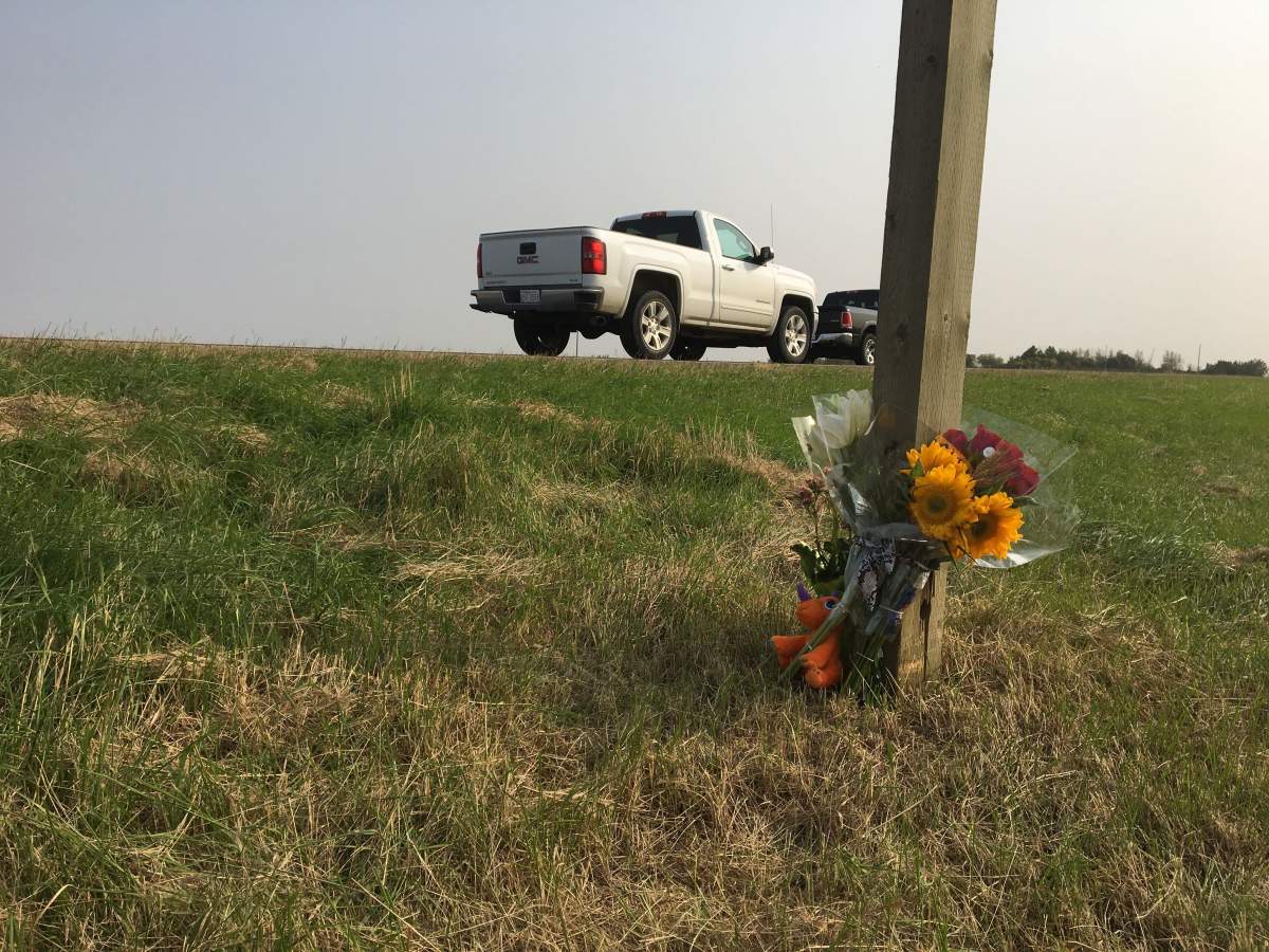 A memorial is seen on the side of Highway 21 where two Sherwood Park teenagers lost their lives Thursday night.