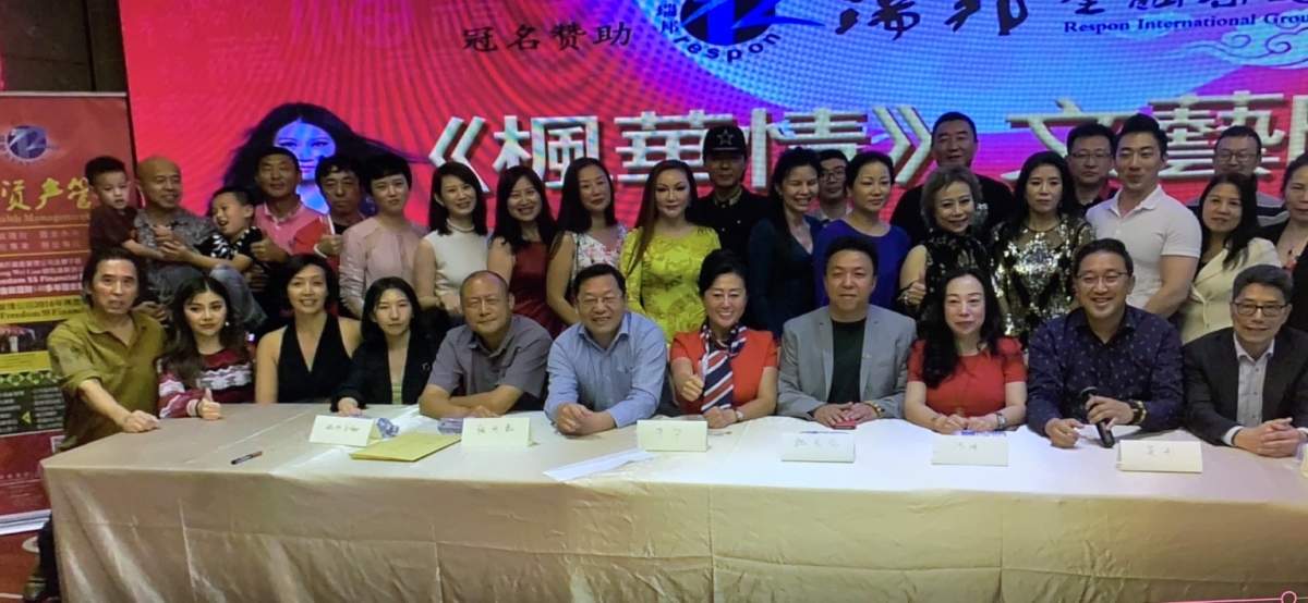In this WeChat photo, Paul King Jin, standing in the back left corner (bald man) attends a meeting with Burnaby Coun. James Wang (in the front row seated with a light gray jacket and black shirt). The photo is dated from 2019 but the exact date could not be confirmed.