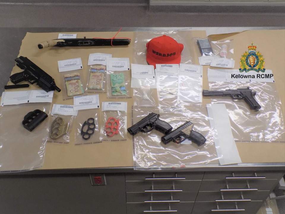 A photo of the seized items. Police say the drug bust happened Wednesday, along Lawson Avenue, with firearms, imitation firearms and illicit drugs being seized.