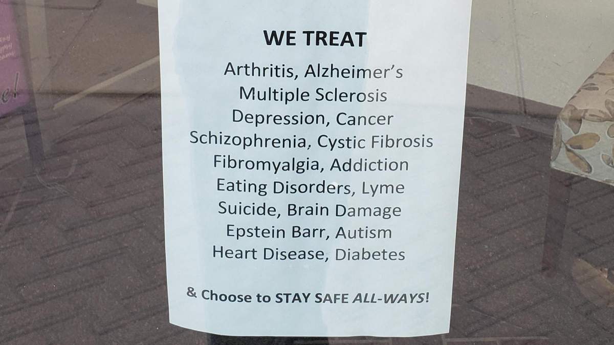 This sign was posted below the anti-mask sign. It claims store staff can treat a variety of serious physical and mental illnesses.