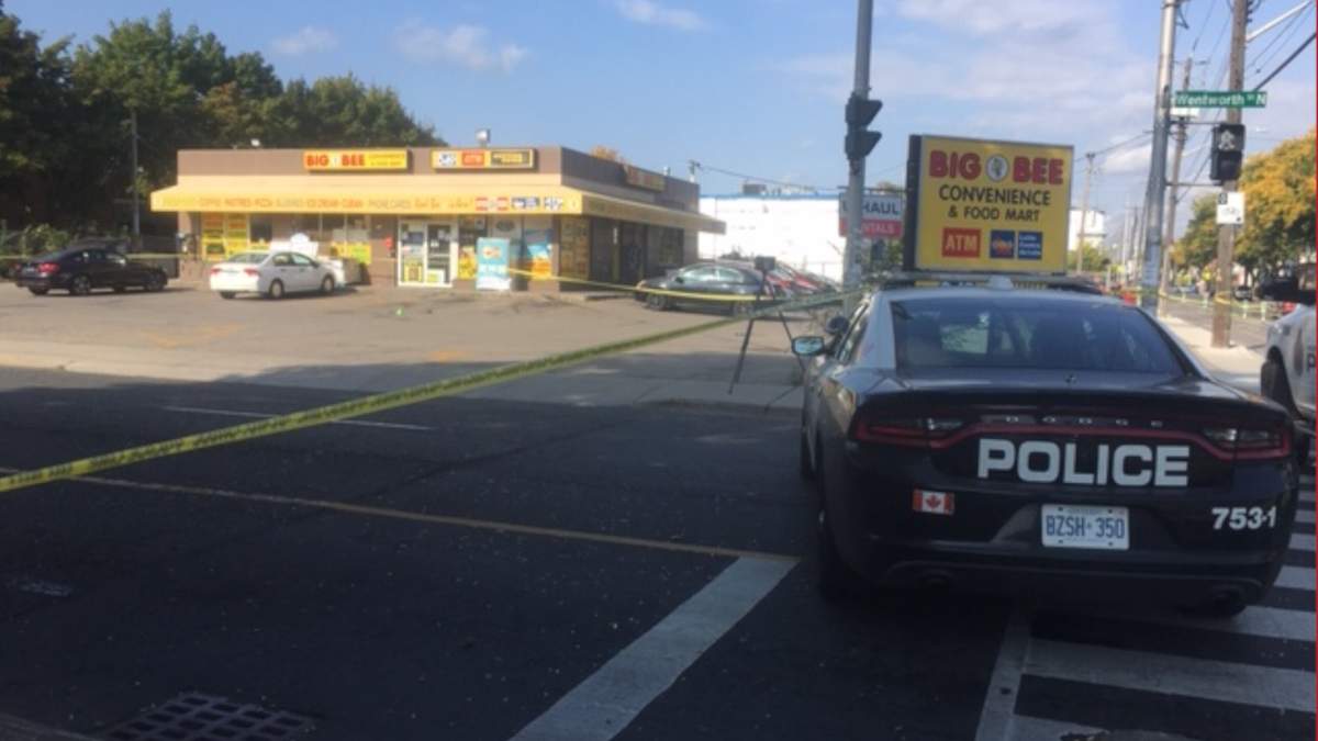 Hamilton police investigate the city's 12th homicide of 2020 near a variety store in the city's centre on Monday, Sept. 28, 2020.