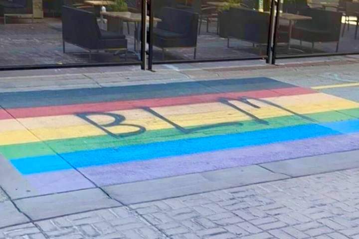 Calgary Pride says it has requested spray paint on the rainbow crosswalk downtown not be touched or changed for the time being.