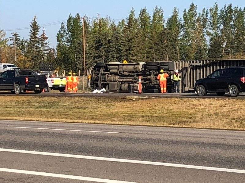 A semi rollover is causing traffic delays on Highway 1, east of the Pilot Butte overpass. 
