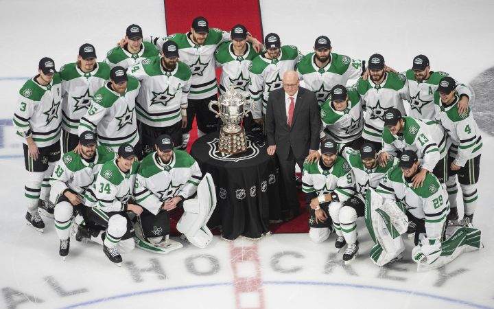 Members of the Dallas Stars pose with the Clarence Campbell Bowl, awarded to the NHL's Western Conference champions,  after beating the Vegas Golden Knights 3-2 in overtime NHL Western Conference final playoff action in Edmonton on Monday, September 14, 2020.