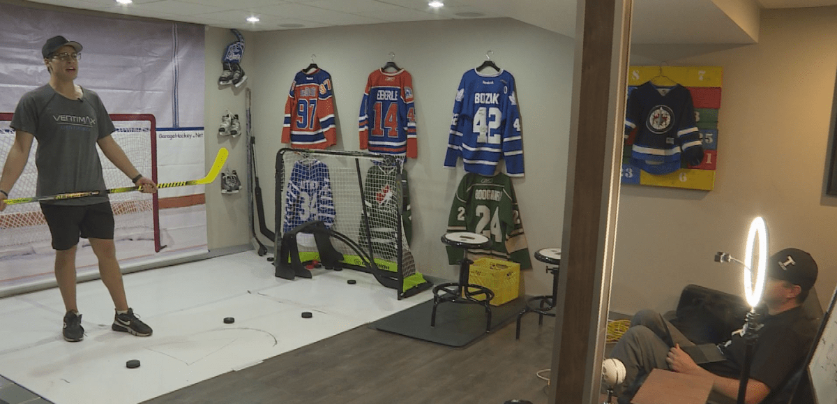 Shae Howorko (left) and Trevor Lakness, owners of TS Hockey Training go through a home-based hockey workout for worldwide clients.