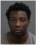 Investigators say Jeffrey Dondji, pictured here, is roughly six feet two inches tall with a prominent scar above the left side of his lip.