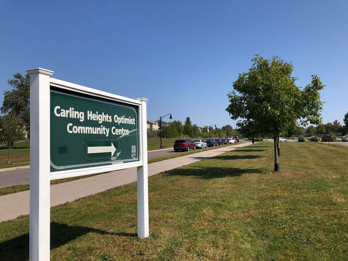The queue outside of the Carling Heights assessment centre on Sept. 23, 2020.