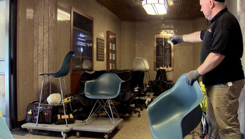 New, high-end furniture is loaded into Vancouver City Hall. 