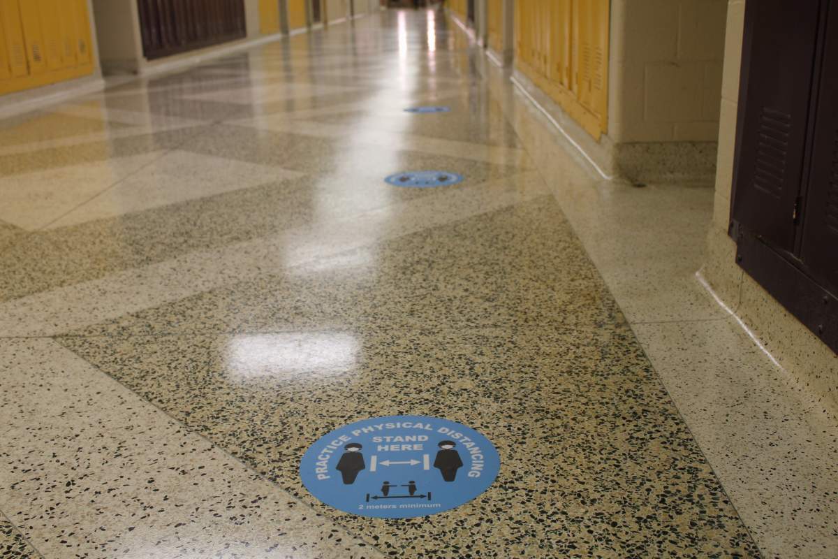 Physical distancing signs will be exhibited in hallways at all HWDSB schools during the 2020-21 school year.