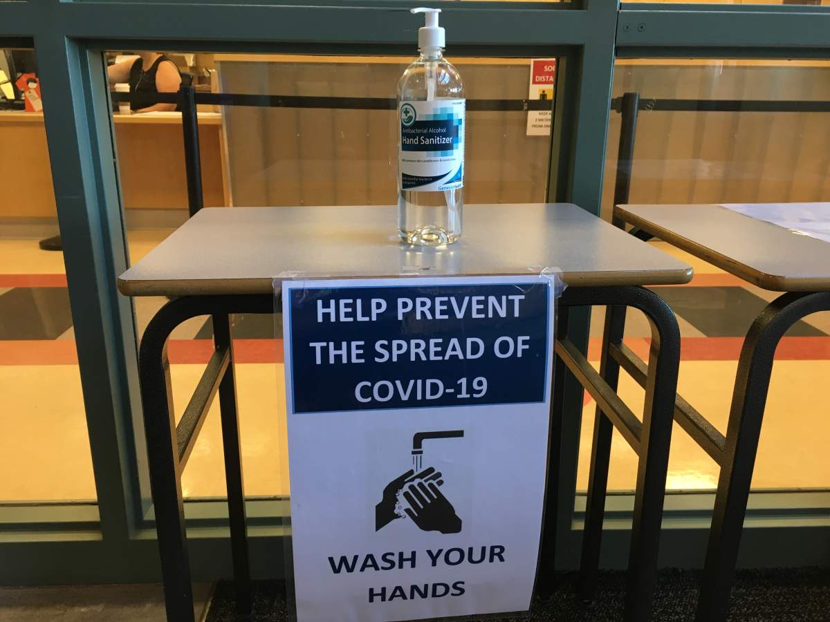 A hand sanitizer station greets students and staff upon entry at Pen High.