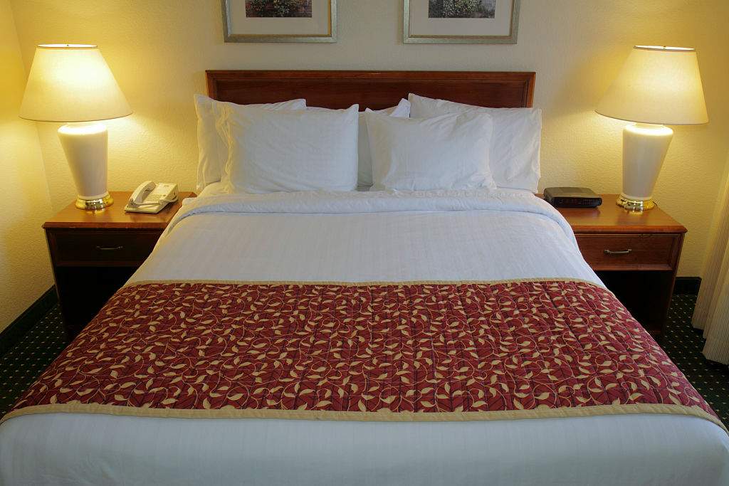 File: Photo of a guest room in a hotel.