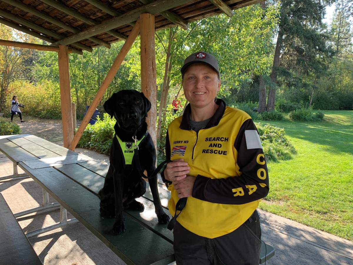 Terry Downs, a member with Central Okanagan Search and Rescue introduces her dog Chase. The two-year-old Labrador Retriever is now an active service dog after passing her validation standards test.