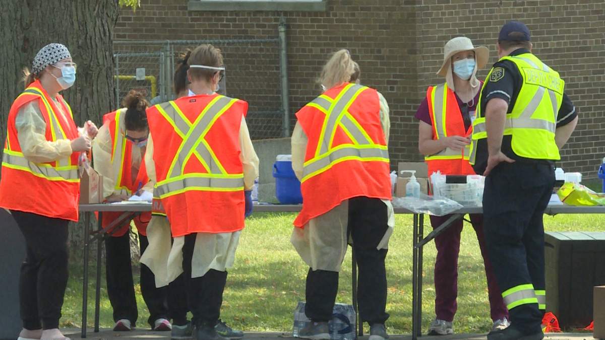 Kingston Health Sciences Centre says in-person booking for the city's COVID-19 assessment centre will have to stay while they work to implement an online booking system. 
