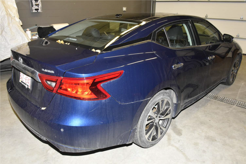 Calgary police say a blue 2017 Nissan Maxima and white 2007 to 2009 Honda CRV thought to be linked to the shooting death of Matthew David Maniago in McKenzie Lake in October 2019.