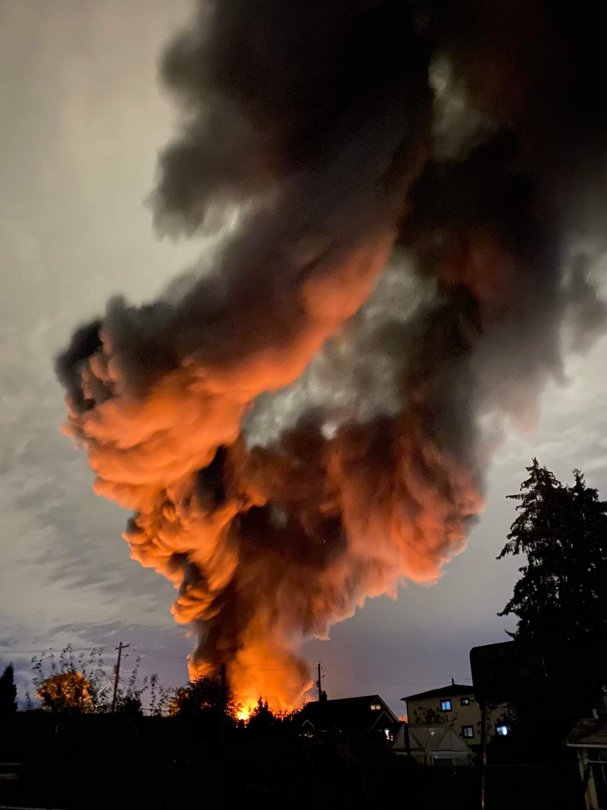 A huge fire burning in an industrial area of New Westminster’s Queensborough neighbourhood Monday evening.