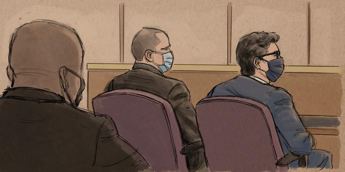 In this courtroom sketch, former Minneapolis police officer Derek Chauvin, center, sits beside his defense attorney during a hearing in Minneapolis, Friday, Sept. 11, 2020.