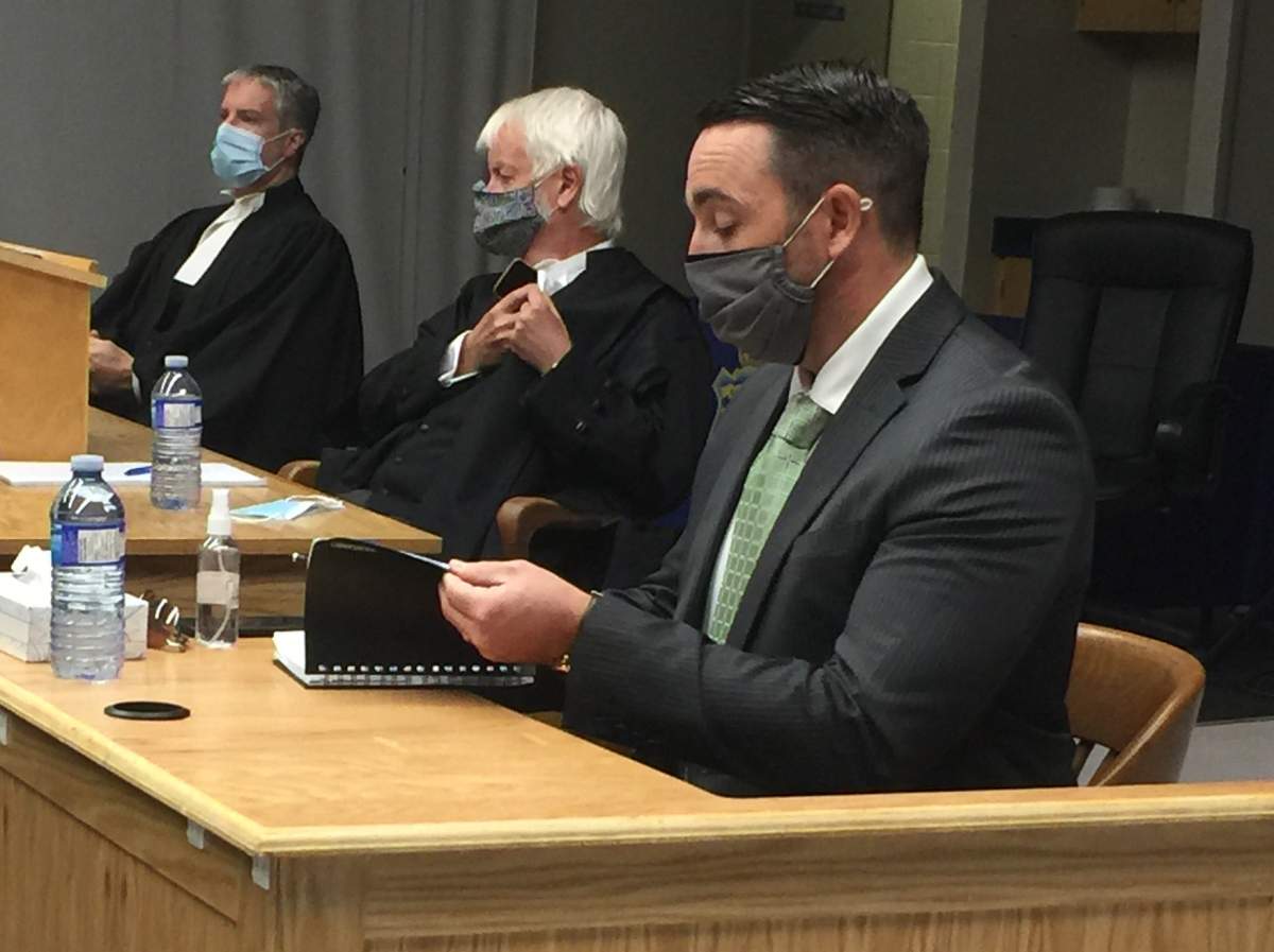 Police officer Carl Douglas Snelgrove (right) takes the stand at his sexual assault trial in St.John's, Tuesday, Sept.22, 2020. THE CANADIAN PRESS/Sarah Smellie.