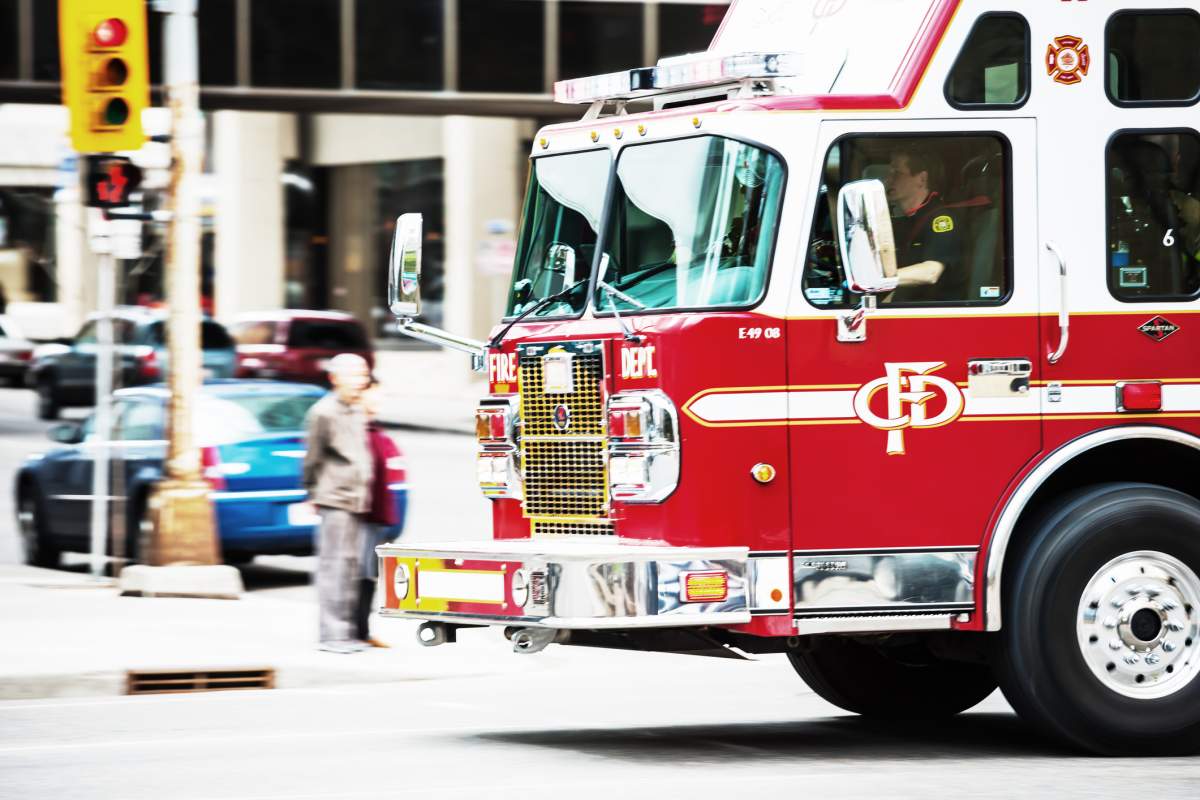 File: A Calgary Fire Department fire truck en route to an emergency call.