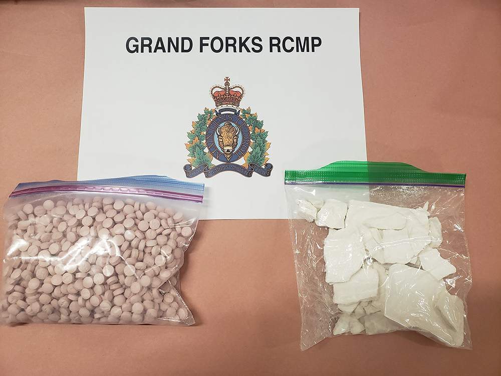 Grand Forks RCMP say after the car was pulled over for being erratically driven, a police dog named Jimmy was called in for suspected drug trafficking. Above are the suspected drugs that were seized.