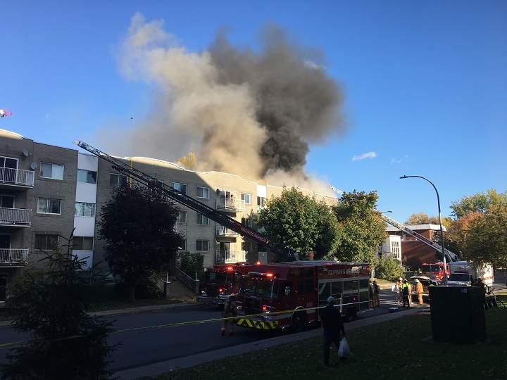 A five-alarm fire on Victoria Street in Greenfield Park has left dozens of families homeless. Wednesday, Oct. 14, 2020.