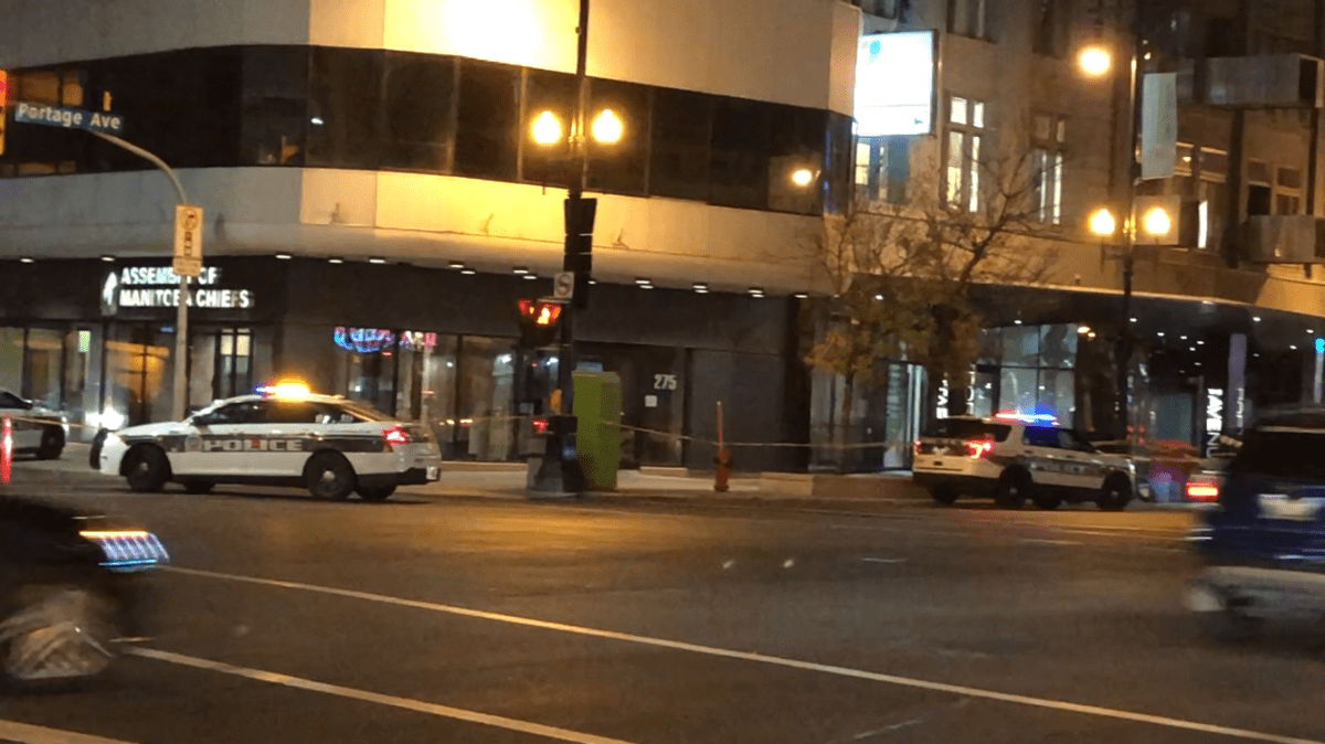 Winnipeg police at the scene of an assault Friday night.